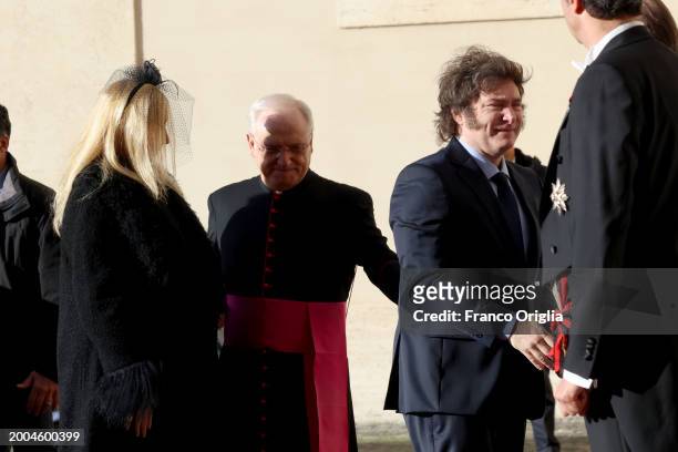 Argentina's President Javier Milei and his sister Karina Elizabeth Milei arrive at the Apostolic Palace for an audience with Pope Francis on February...