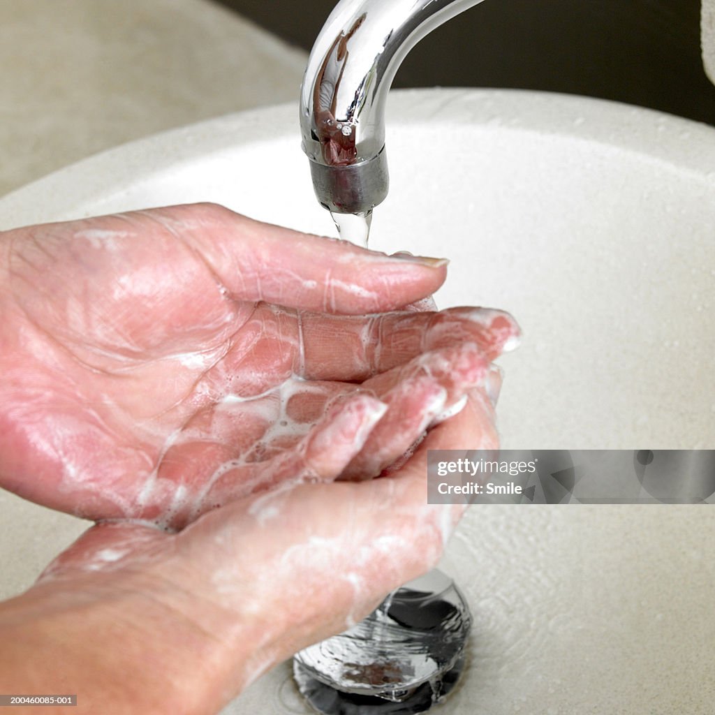 Woman washing hands