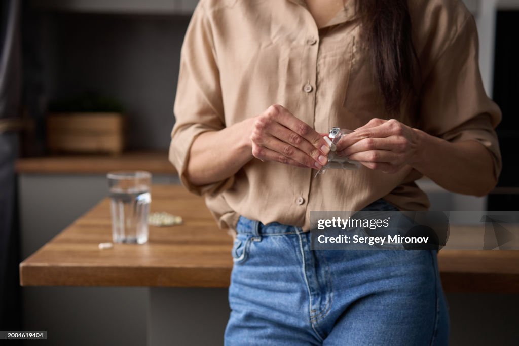Woman Taking Medication