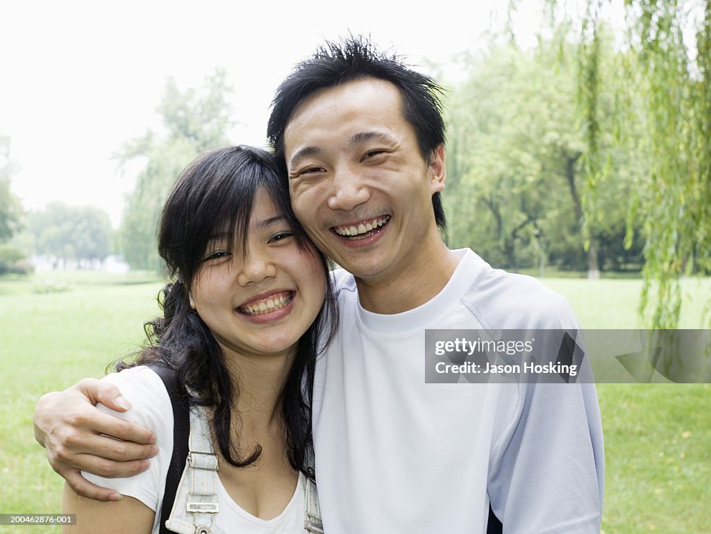 China, Hangzhou, West Lake, young couple smiling