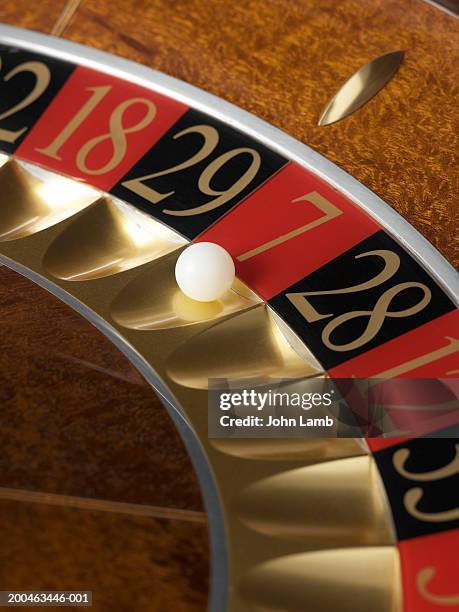 roulette wheel and ball, close-up - roulette stock-fotos und bilder