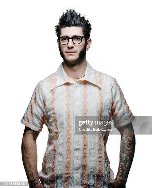 man with pronounced sideburns wearing vintage striped shirt - spiky hair stock pictures, royalty-free photos & images