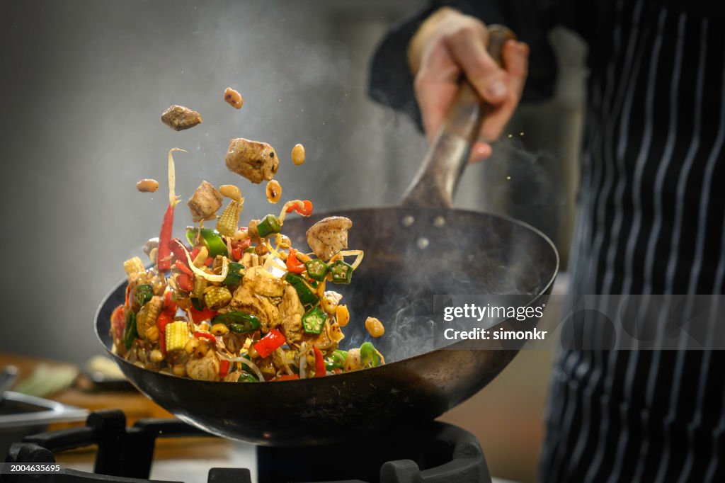 Chef preparing food in restaurant kitchen