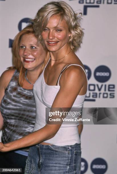 American actress Cameron Diaz, wearing a white singlet and jeans, in the press room of the 2000 MTV Movie Awards, held at Sony Pictures Studios in...