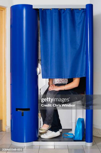 teenage couple (15-17) inside photo booth, low section - photo booth couple stock pictures, royalty-free photos & images