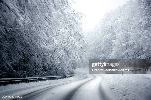 germany, bavaria, hohenschaftlarn, road and winter landscape - snowy road stock pictures, royalty-free photos & images