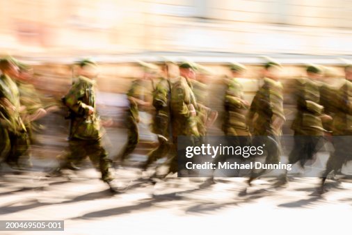 Soldiers running, (blurred motion) Soldiers running, (blurred motion)