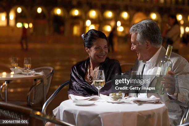 italy, venice, couple at restaurant table at night, outdoors - venice with couple stock pictures, royalty-free photos & images