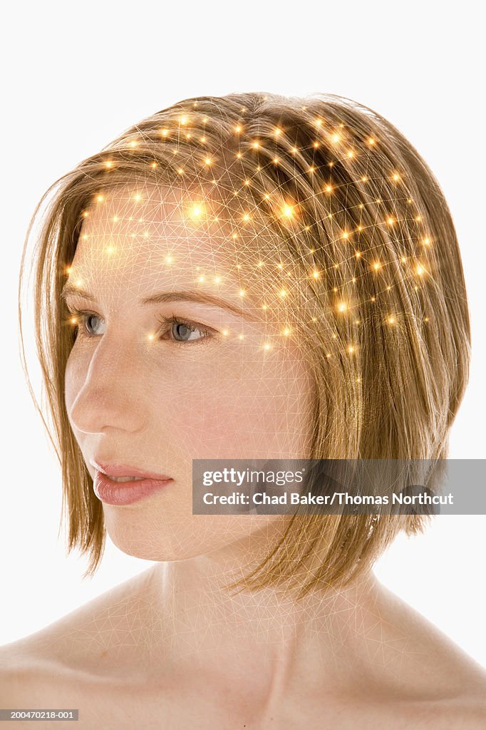 Young woman with lights surrounding head (Digital Composite)
