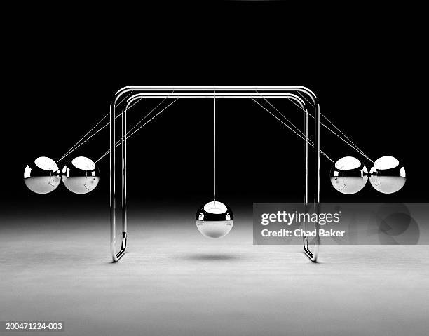 newton's cradle (digital) - domino effect stock pictures, royalty-free photos & images