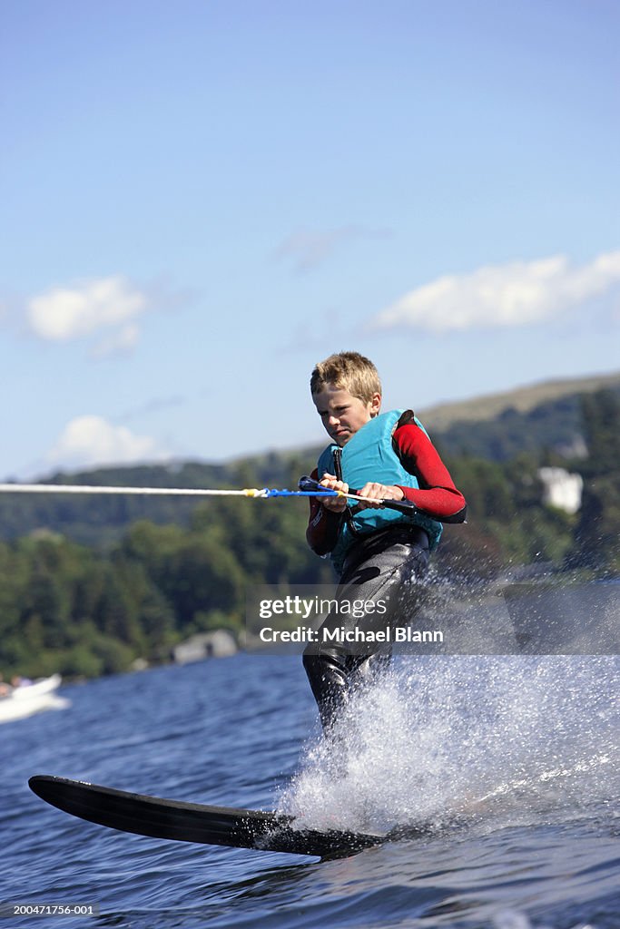 Teenage boy (13-15) waterskiing