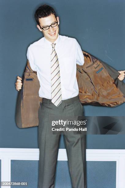 Jacket Off Taking Off Coat Photos and Premium High Res Pictures - Getty Images