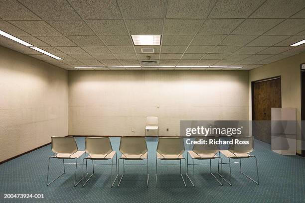 empty meeting room with chairs - chairs in a row stock pictures, royalty-free photos & images