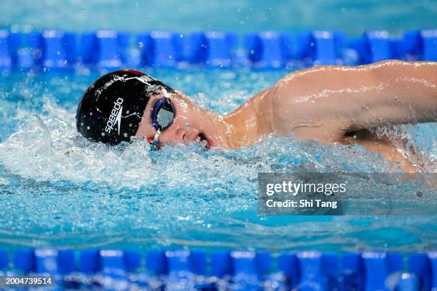 Zhanle Pan of Team China competes in the Men's 200m Freestyle Heat 6 on day eleven of the Doha 2024 World Aquatics Championships at Aspire Dome on...