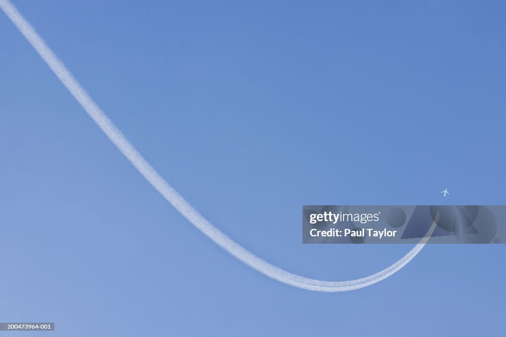 Jet vapour trail in sky (Digital Enhancement)