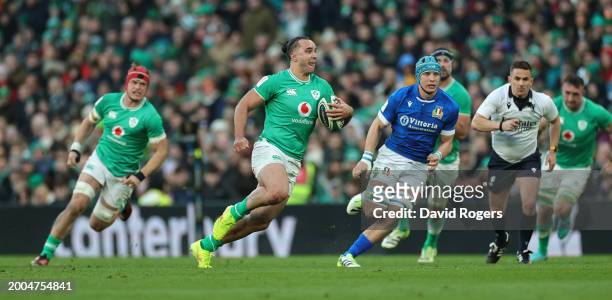 James Lowe of Ireland charges upfield during the Guinness Six Nations 2024 match between Ireland and Italy at Aviva Stadium on February 11, 2024 in...