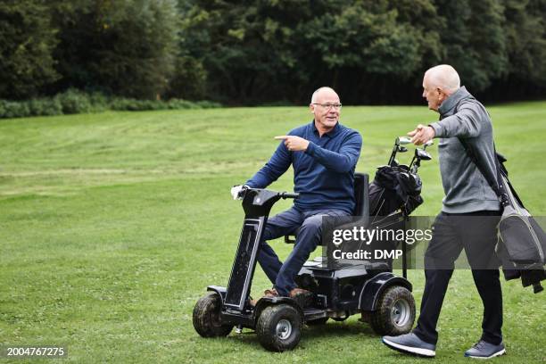 sports, golf cart and senior man friends walking on green together for retirement hobby or leisure. summer, field or game with elderly person with disability riding golfer vehicle on grass course - championship day two stock pictures, royalty-free photos & images