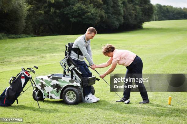 personal trainer, person with disability and people for golf in game, match and competition on golfing course. recreation, sports and woman and man with club for training, fitness and field practice - championship round two stock pictures, royalty-free photos & images