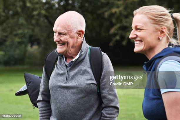 senior man, golf course and happy with for game with fitness, health and workout on grass for sport. elderly person, people and field for competition, contest and smile on lawn for outdoor training - championship round two stock pictures, royalty-free photos & images