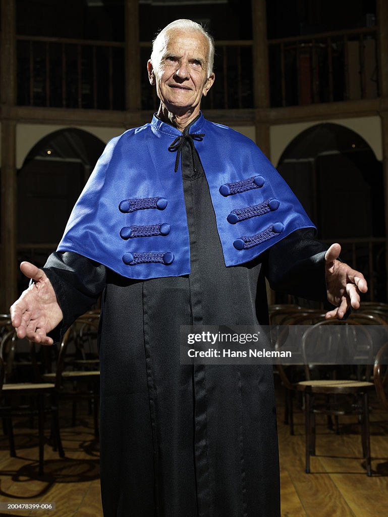 Dean extending hands, portrait