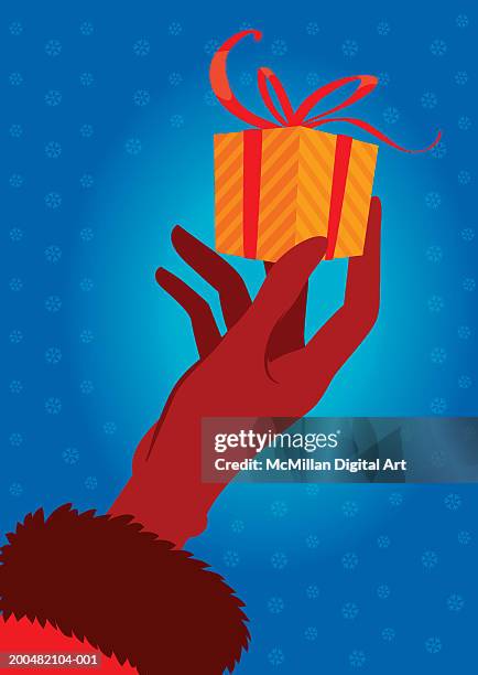 woman holding gift, close-up of hand - ethnic woman at christmas stock illustrations