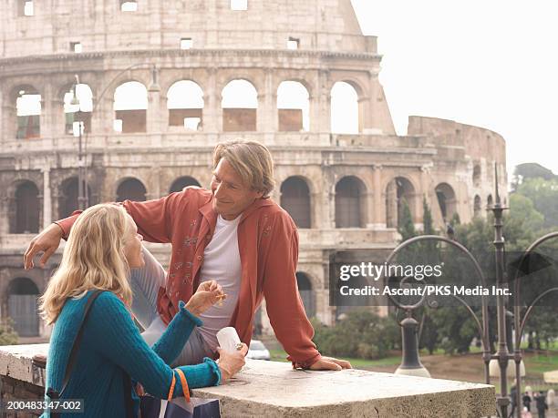 italy, rome, couple talking, woman opening jewelry gift - rome stock pictures, royalty-free photos & images