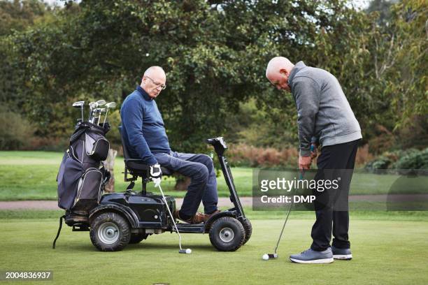 elderly, men and golf on course, sports together and retirement with club and play game on field. ready for swing, exercise and wellness, active pensioner friends outdoor and cart for moving around - active seniors golf stock pictures, royalty-free photos & images