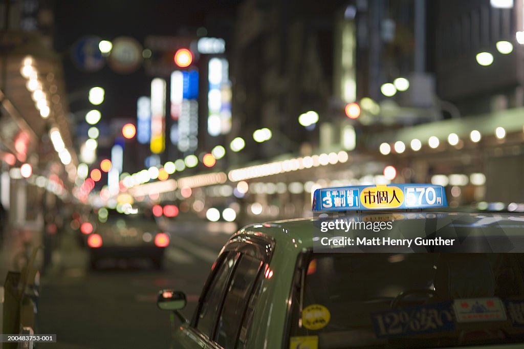 Japan, Kyoto, street scene, night (focus on foreground)