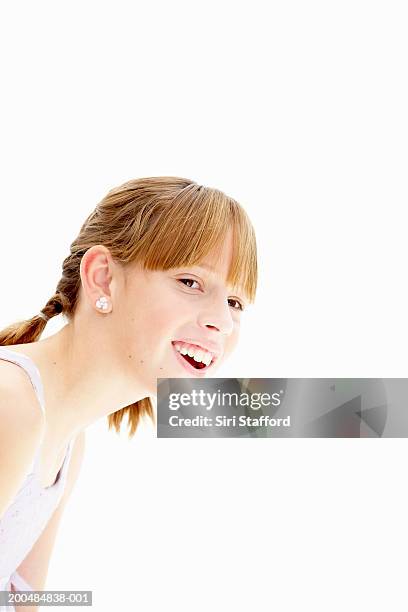 Girl Looking In Smiling High-Res Stock Photo - Getty Images