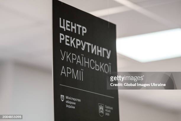 Recruiting Centre of Ukrainian Army’ text is seen during the opening of the centre on February 12, 2024 in Lviv, Ukraine. Ministry of Defence,...