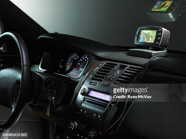 dashboard and global positioning system in car - armaturenbrett stock-fotos und bilder
