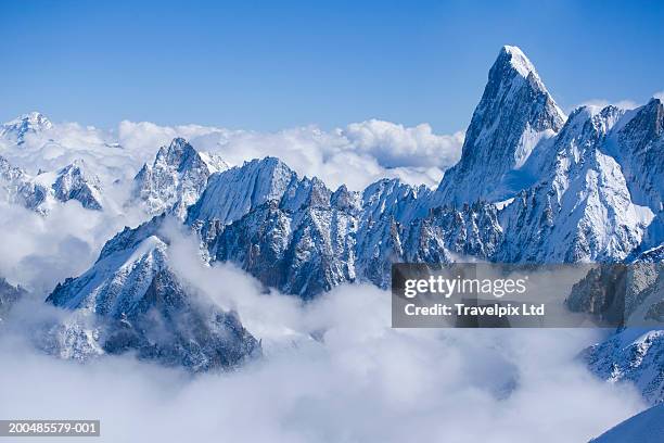 france, chamonix, view over alps to switzerland, clouds - european alps foto e immagini stock
