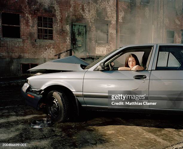woman in car after crash, portrait - accident car photos et images de collection