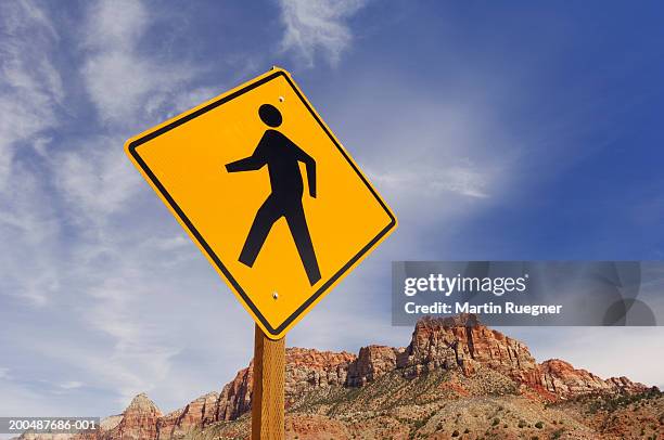 pedestrian road sign - uneven stock pictures, royalty-free photos & images