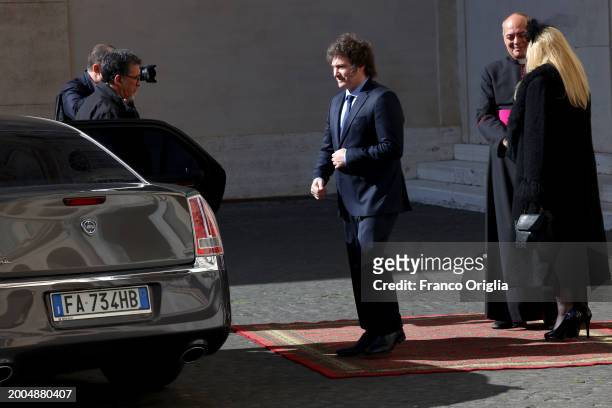 Argentina's President Javier Milei and his sister Karina Elizabeth Milei leave the Apostolic Palace after an audience with Pope Francis on February...