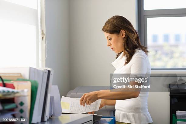 Person Filing Work Filing Paperwork Photos and Premium High Res Pictures - Getty Images