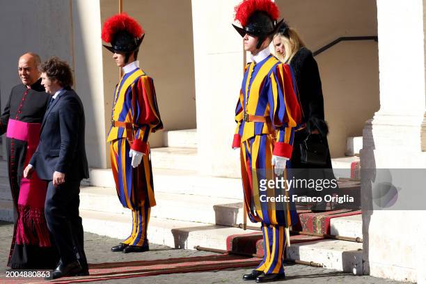Argentina's President Javier Milei and his sister Karina Elizabeth Milei leave the Apostolic Palace after an audience with Pope Francis on February...