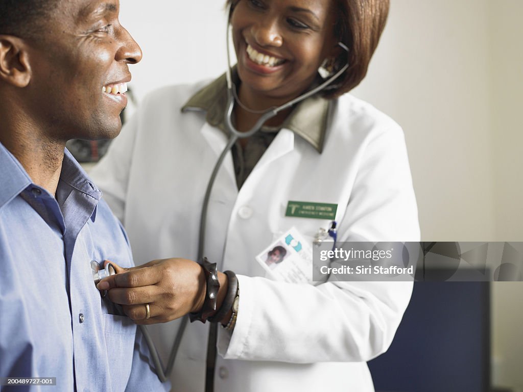 Female doctor examining patient
