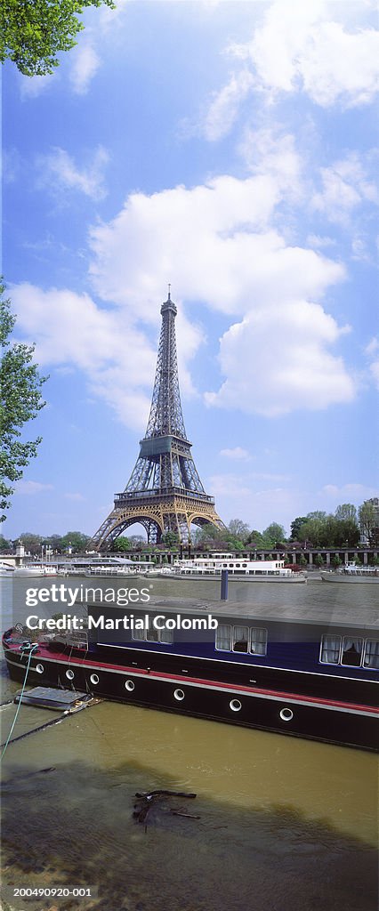 France, Paris, boat on River Seine by Eiffel tower