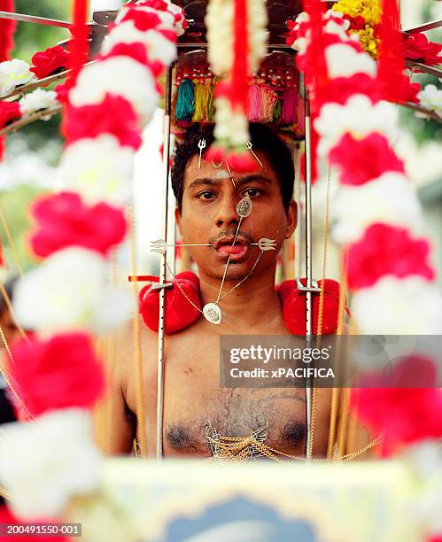 singapore, thaipusam indian festival participant - thaipusam stock pictures, royalty-free photos & images