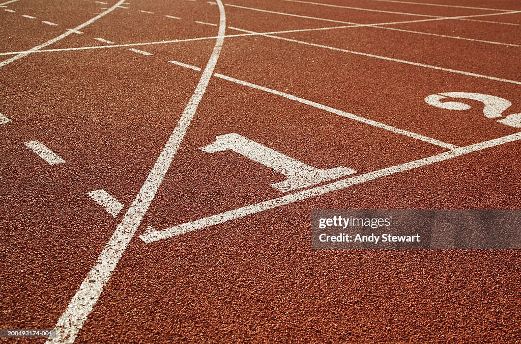 Athletic track, lane one in foreground