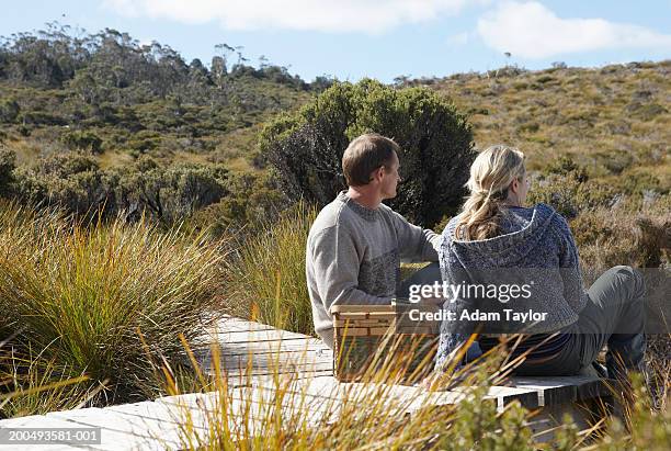 couple looking at view from boardwalk - boardwalk australia stock pictures, royalty-free photos & images