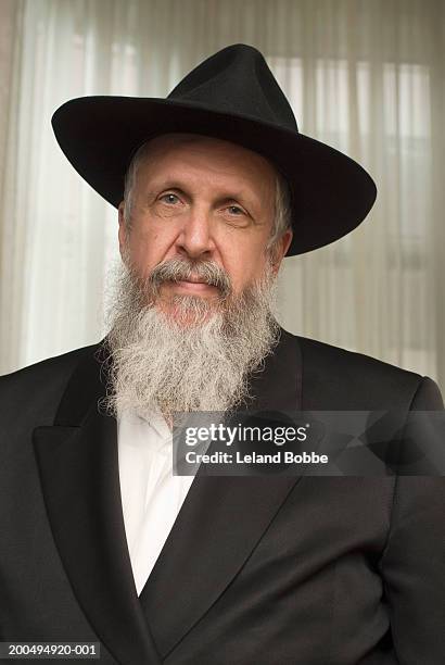 hassidic man at home, portrait - hasidic jew stock-fotos und bilder