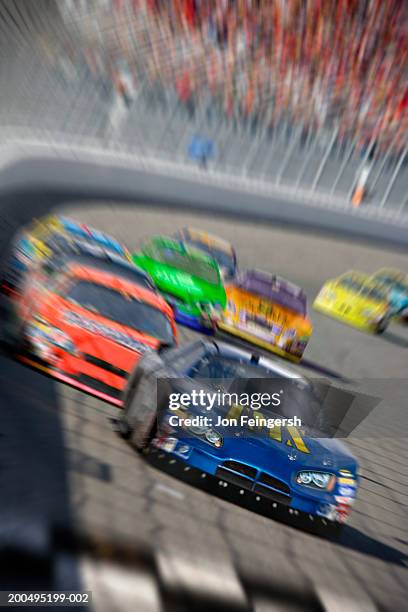 stock car race (digital composite, digital enhancement) - siegerstraße nascar stock-fotos und bilder