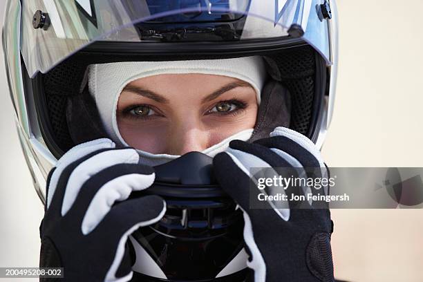 female race car driver wearing helmet, close-up, portrait - women motorsport stock pictures, royalty-free photos & images