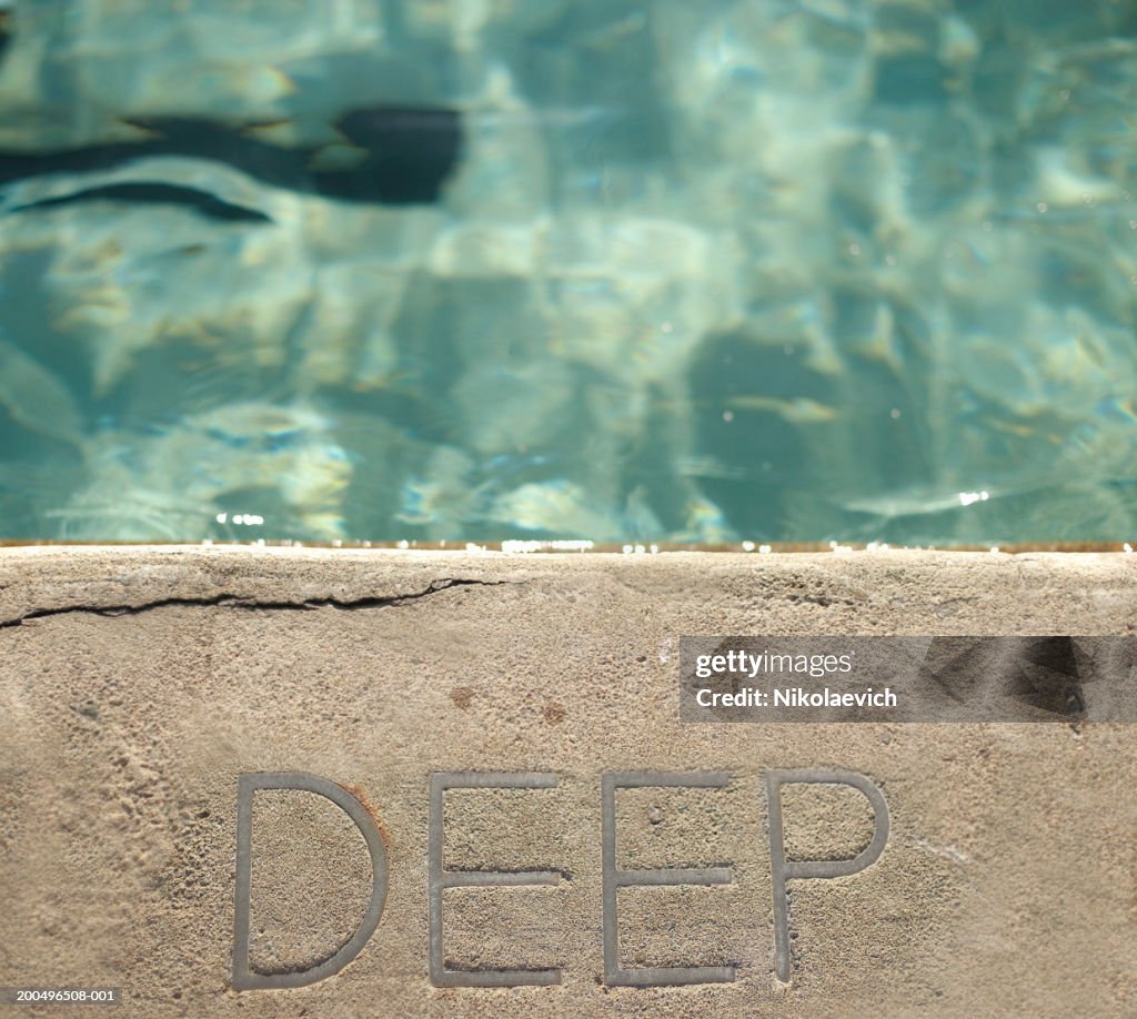 'Deep' sign on swimming pool