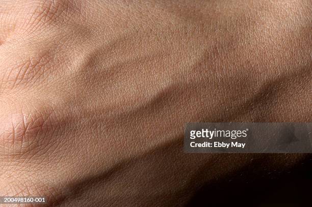 back of hand with veins, close up - human skin stock pictures, royalty-free photos & images