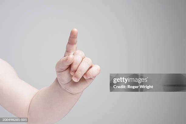 baby boy  (6-9 months), close-up of finger - one baby boy only fotografías e imágenes de stock