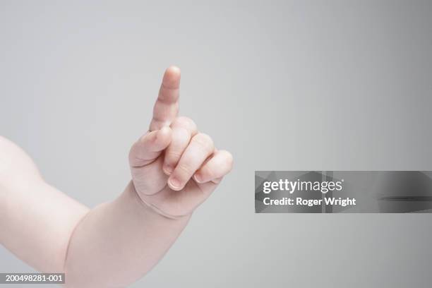 baby boy  (6-9 months), close-up of finger - baby pointing stock pictures, royalty-free photos & images