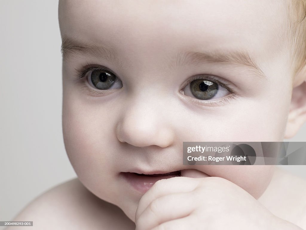Baby boy (6-9 months), close-up